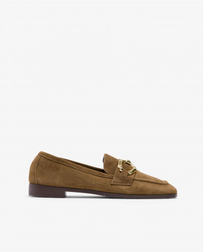 Moccasin Buckle against brown
